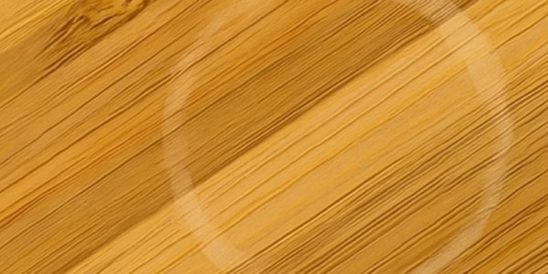 Comment enlever une tache d'eau sur un meuble ciré ?